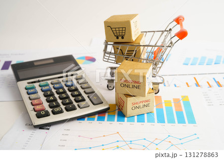 Online shopping, Shopping cart box on business graph, import export, finance commerce. 131278863