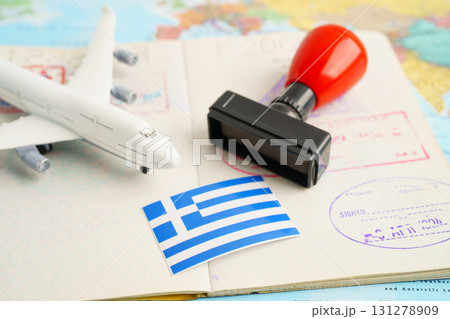 Greece passport with approved stamp on document for tourism to immigration at airport in country. 131278909