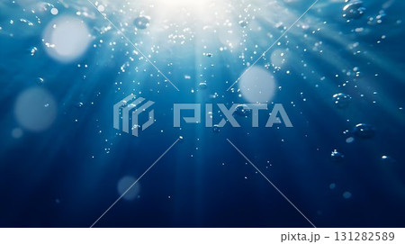 deep blue sea background, bubbles rising towards the surface 131282589