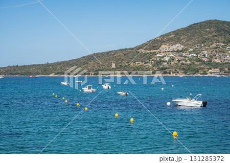 Spectacular view Golf at Sagone Corsica France beautyful sand Beach boats mountain village Tourism and vacations concept 131285372