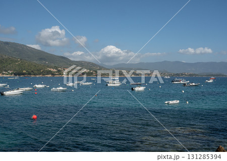 Spectacular view Golf at Sagone Corsica France beautyful sand Beach boats mountain village Tourism and vacations concept 131285394