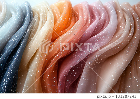 Couture embroidery. Diversity of bridal tulle with crystal embellishments is hanging on the wall. 131287243