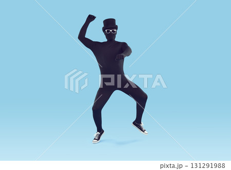 Mysterious faceless man dressed in black bodysuit dancing Mysterious faceless man dressed in black bodysuit dancing 131291988