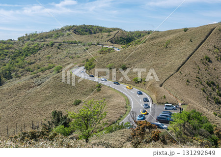 Darumayama mountain at Namazu, Shizuoka, Japan, Cars driving on winding mountain road in rural landscape with clear sky Darumayama mountain at Namazu, Shizuoka, Japan, Cars driving on winding mountain road in rural landscape with clear sky 131292649