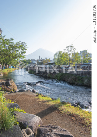 River flowing through park with mountain view in clear daylight at Fujinomiya, Shizuoka, Japan, River flowing through park with mountain view in clear daylight at Fujinomiya, Shizuoka, Japan, 131292736