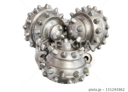 Close up picture of a tricone drill bit used for drilling oil or geothermal wells isolated on white background, selective focus. 131293862