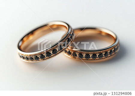 Pair of Wedding Rings on a white background. 131294806