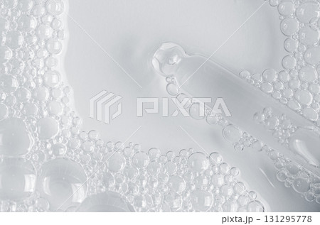 Bubbles of body gel or soap foam or shaving gel. Closeup. Copy space 131295778