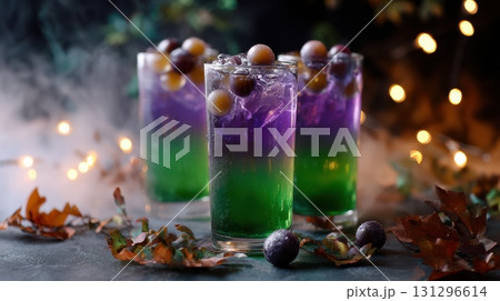 Halloween punch in spooky colors with candy and fog effect, moody beverage photo for print, sublimation or themed party design Halloween punch in spooky colors with candy and fog effect, moody beverage photo for print, sublimation or themed party design 131296614