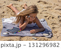 Child making creative rock art with colorful felt pens 131296982