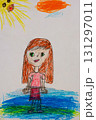 Girl under sun drawn by child with wax crayons 131297011