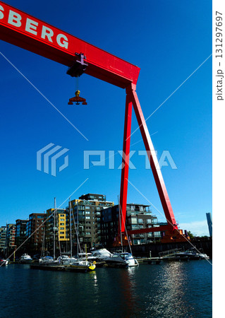 Eriksberg area on Hisingen in Gothenburg, former shipyard with big gantry crane near Alvsborg bridge, Sweden, sunny summer day 131297697