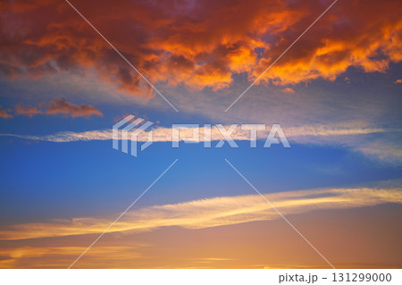 Sunset sky clouds orange and blue 131299000