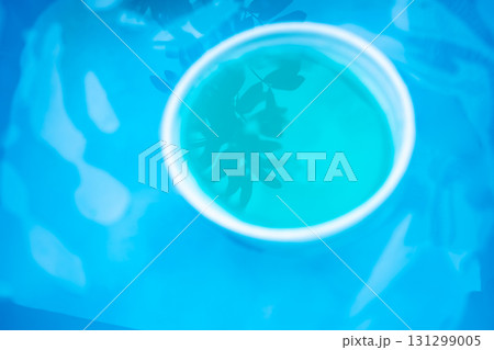 Abstract blue and turquoise water container 131299005