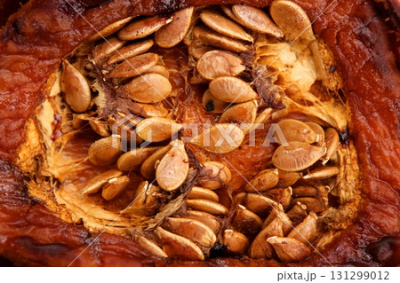 Oven baked pumpkin with seeds 131299012