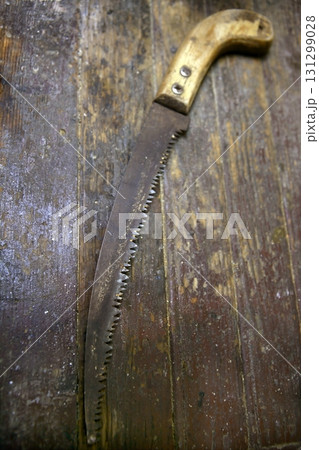 Aged grunge wood saw tool wooden board 131299028