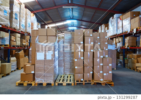 Warehouse stograge with stacked boxes in rows 131299287