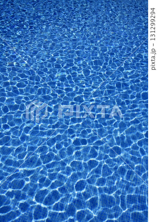 Blue water texture, tiles pool in sunny day Blue water texture, tiles pool in sunny day 131299294