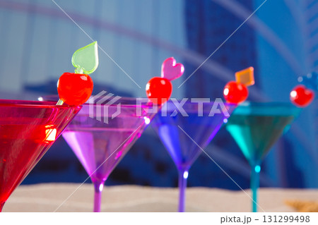 colorful cocktail in a row with cherry sand in urban city colorful cocktail in a row with cherry sand in urban city 131299498