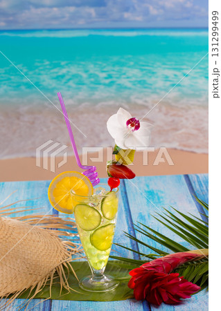 Lemon lime cocktail mojito on tropical beach 131299499