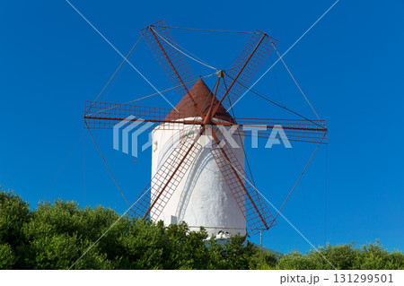 Menorca Es Mercadal windmill on blue sky at Balearics Menorca Es Mercadal windmill on blue sky at Balearics 131299501