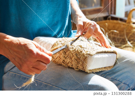 Esparto halfah grass crafts craftsman hands 131300288