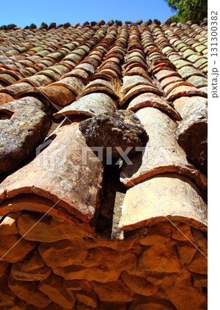 clay roof tiles old aged arabic style in Spain clay roof tiles old aged arabic style in Spain 131300382