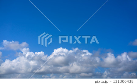 Blue summer sky with cumulous clouds Blue summer sky with cumulous clouds 131300439