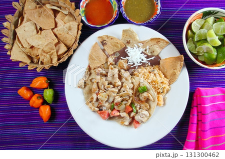 Chicken tacos Mexican style chili sauce and nachos Chicken tacos Mexican style chili sauce and nachos 131300462