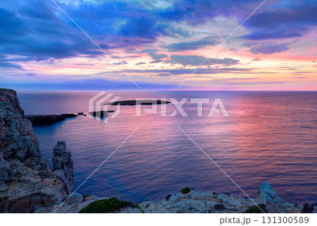 Menorca sunset in Cap de Caballeria cape at Balearic Menorca sunset in Cap de Caballeria cape at Balearic 131300589