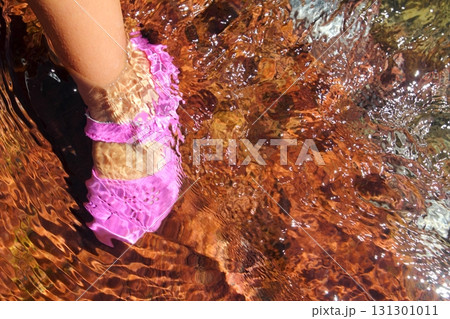Girl water feet pink shoe in river stream red bottom Girl water feet pink shoe in river stream red bottom 131301011