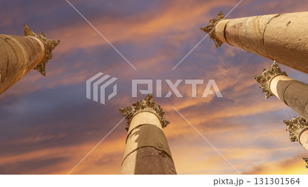 Roman Columns in the Jordanian city of Jerash (Gerasa of Antiquity), capital and largest city of Jerash Governorate, Jordan. Against the background of a beautiful sky with clouds Roman Columns in the Jordanian city of Jerash (Gerasa of Antiquity), capital and largest city of Jerash Governorate, Jordan. Against the background of a beautiful sky with clouds 131301564