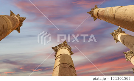 Roman Columns in the Jordanian city of Jerash (Gerasa of Antiquity), capital and largest city of Jerash Governorate, Jordan. Against the background of a beautiful sky with clouds Roman Columns in the Jordanian city of Jerash (Gerasa of Antiquity), capital and largest city of Jerash Governorate, Jordan. Against the background of a beautiful sky with clouds 131301565