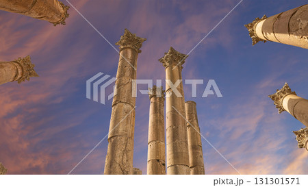 Roman Columns in the Jordanian city of Jerash (Gerasa of Antiquity), capital and largest city of Jerash Governorate, Jordan. Against the background of a beautiful sky with clouds 131301571