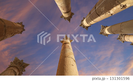 Roman Columns in the Jordanian city of Jerash (Gerasa of Antiquity), capital and largest city of Jerash Governorate, Jordan. Against the background of a beautiful sky with clouds Roman Columns in the Jordanian city of Jerash (Gerasa of Antiquity), capital and largest city of Jerash Governorate, Jordan. Against the background of a beautiful sky with clouds 131301596