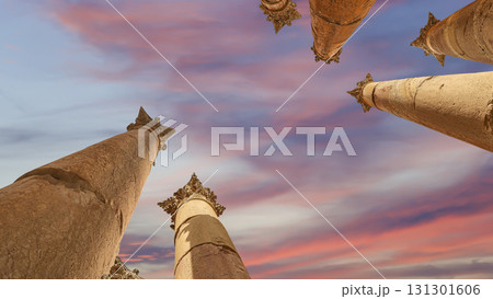 Roman Columns in the Jordanian city of Jerash (Gerasa of Antiquity), capital and largest city of Jerash Governorate, Jordan. Against the background of a beautiful sky with clouds Roman Columns in the Jordanian city of Jerash (Gerasa of Antiquity), capital and largest city of Jerash Governorate, Jordan. Against the background of a beautiful sky with clouds 131301606