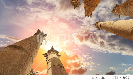Roman Columns in the Jordanian city of Jerash (Gerasa of Antiquity), capital and largest city of Jerash Governorate, Jordan. Against the background of a beautiful sky with clouds 131301607