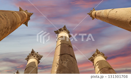 Roman Columns in the Jordanian city of Jerash (Gerasa of Antiquity), capital and largest city of Jerash Governorate, Jordan. Against the background of a beautiful sky with clouds Roman Columns in the Jordanian city of Jerash (Gerasa of Antiquity), capital and largest city of Jerash Governorate, Jordan. Against the background of a beautiful sky with clouds 131301708