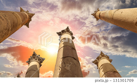 Roman Columns in the Jordanian city of Jerash (Gerasa of Antiquity), capital and largest city of Jerash Governorate, Jordan. Against the background of a beautiful sky with clouds Roman Columns in the Jordanian city of Jerash (Gerasa of Antiquity), capital and largest city of Jerash Governorate, Jordan. Against the background of a beautiful sky with clouds 131301709