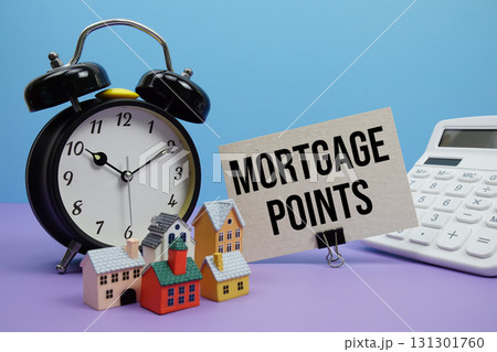 Mortgage Points phrase with Calculator, alarm clock, Model Houses Real Estate Financial Concept 131301760