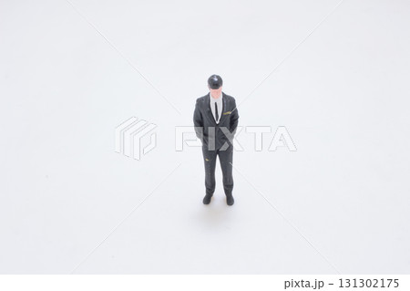 Miniature Businessman Figurine Standing in Black Suit Miniature Businessman Figurine Standing in Black Suit 131302175
