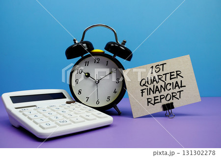 1st Quarter Financial Report text with calculator and alarm clock on blue and purple background 131302278