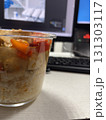 Food in a container on the desk 131303117