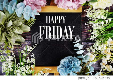 Happy Friday text with flowers bouquet decoration on wooden background 131303839