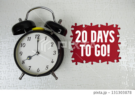 20 Days To Go! text with alarm clock on red background 20 Days To Go! text with alarm clock on red background 131303878