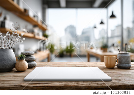 Minimal wooden table with blurred cafe interior in background 131303932
