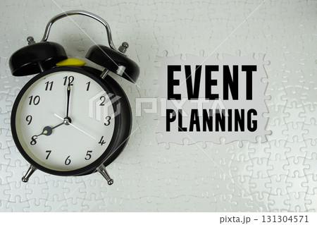 Event Planning text with alarm clock on white background Event Planning text with alarm clock on white background 131304571