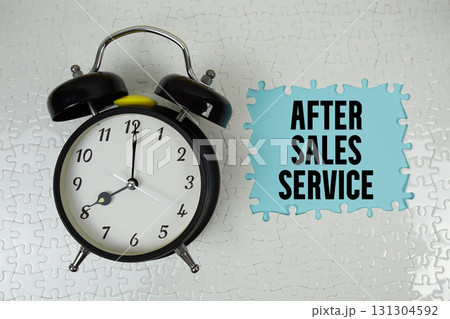 After Sales Service text with alarm clock on blue background 131304592
