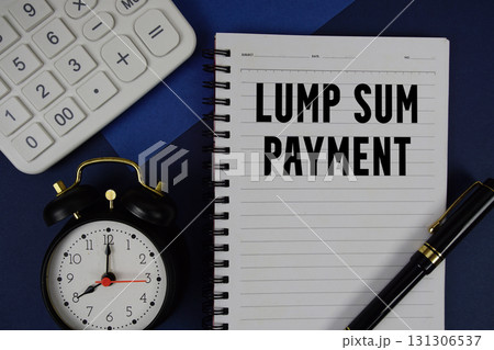 Lump Sum Payment text written on notepad with calculator and alarm clock on navy blue background Lump Sum Payment text written on notepad with calculator and alarm clock on navy blue background 131306537