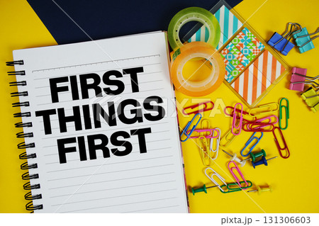 First Things First text with stationery on yellow background First Things First text with stationery on yellow background 131306603